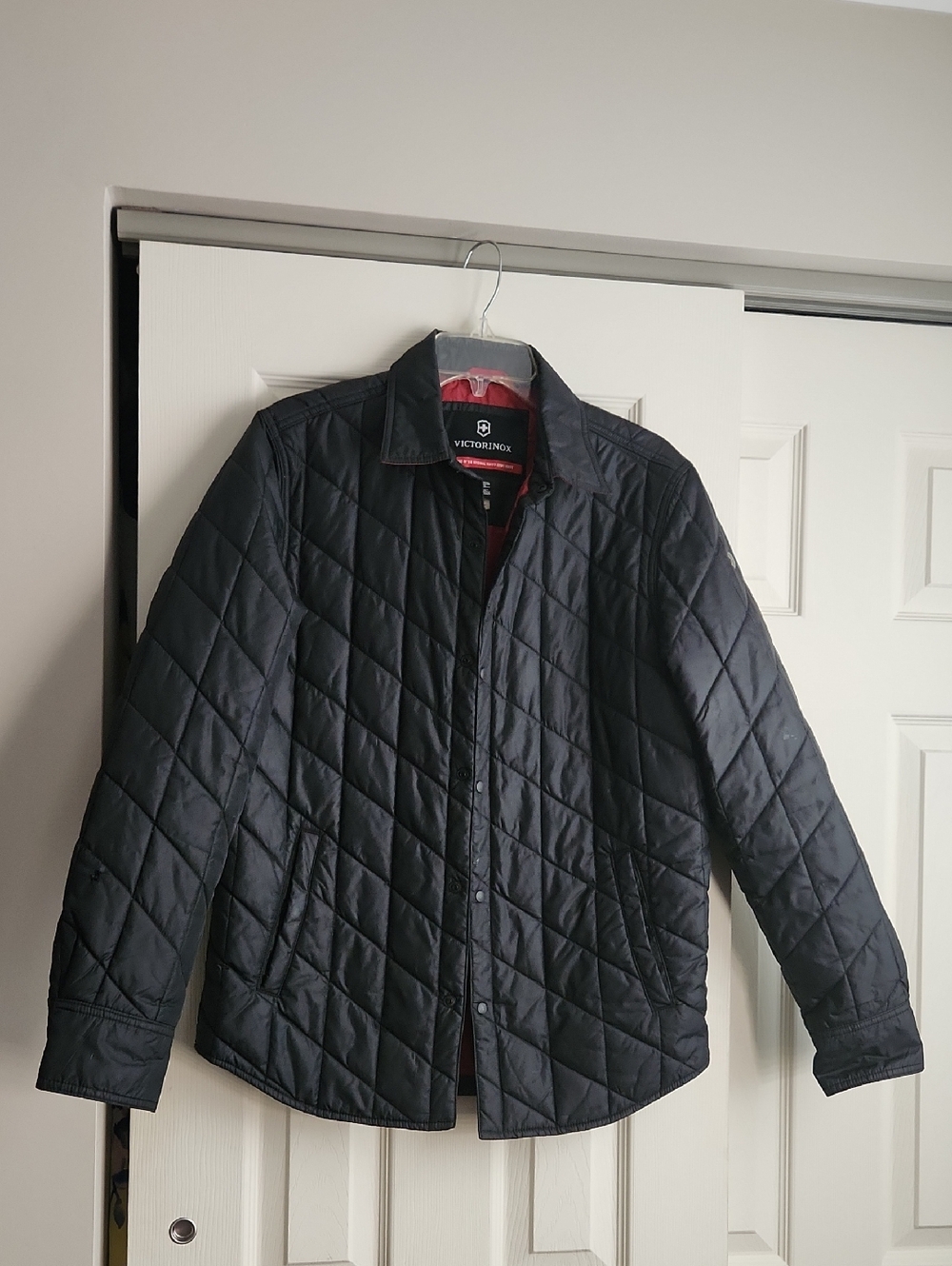 Victorinox Men's Quilted Black Puffer Jacket with Red Lining